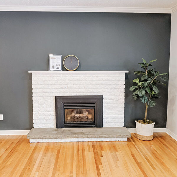 Living Room After Painted Fireplace - Will MacLean - Copper Co - REI - Real Estate Investor - Joint Venture Partner - Working Partner - BRRRR - House Flips - Basement Duplex Conversion - Ottawa
